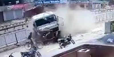 Cyclist crushed by out of control truck.