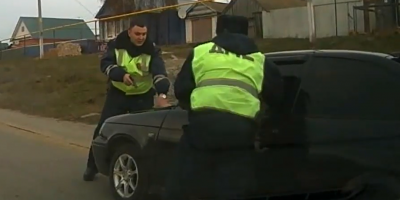 Cops Shoot Wheels Of Stolen Lada After Chase In Russia