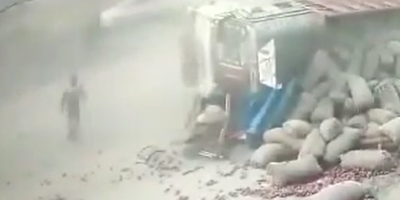 Cyclists Get Buried Alive By Vegetable Truck