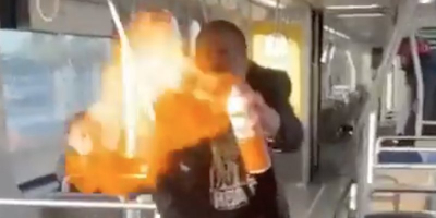 Homeless Meth Head Attacks People w/ Homemade Flamethrower On Train