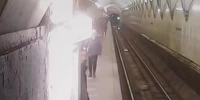 Buddy Survives After Falling In Front Of Moving Train In Moscow Subway