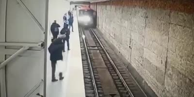 Drunk Falls In Front Of Train
