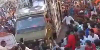 Truck in India runs over festival goers.