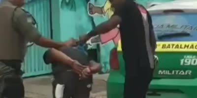 Cop Smacking Handcuffed Suspect In Brazil