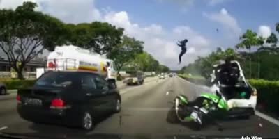 Motorcycle passenger catapulted 65 feet through the air after slamming into stationary vehicle(R)