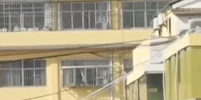 Firefighter and woman he tries to rescue fall from building(R)