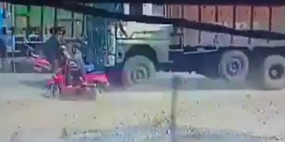 Dudes On Red Sooter Fall Under The Truck In India