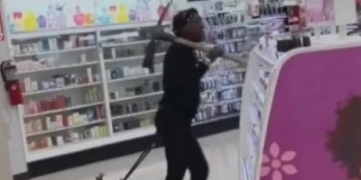 Psychopath with rusty pick-axe storms drug store