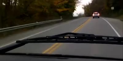 Passenger records erratic driver, ends up involved in car accident.