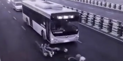 Scooter Rider Pushed Under The Bus Wheels
