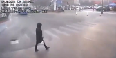 Woman Ran Over By Bus In China