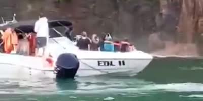 Big rock falls over tourists in Brazil (Amother angle)