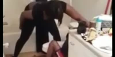 Big woman kicks her cheating man's ass.