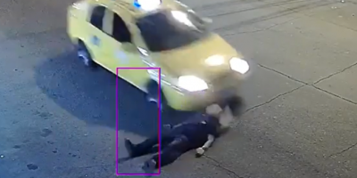 Inebriated Guy Falls In Front Of Taxi