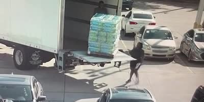 Woman Buried By Water Bottles.