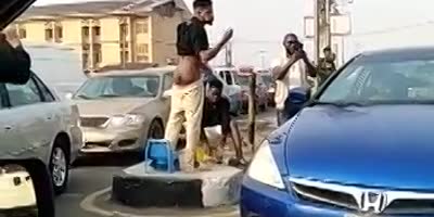 WTF: Dudes Eating Own Shit In Nigeria