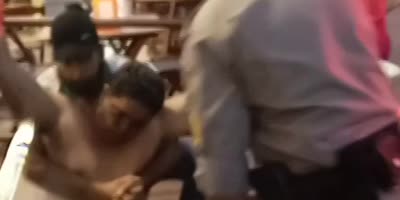 Rescue Of Choked Man In Street Bar