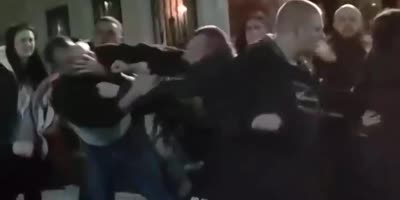 Couples Fighting Outside The Restaurant In Russia