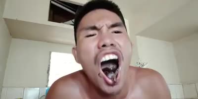 Disgusting! Men Eat Cockroaches Alive