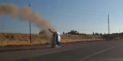 Wild moment car flies over highway & crash lands but driver survives (R)