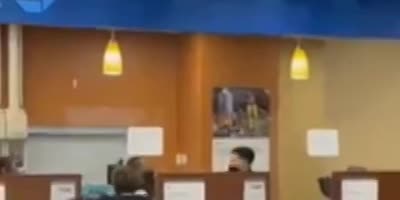 Woman flips in Bank