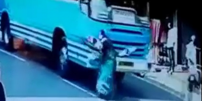 Careless Woman Ran Over By The Bus In India