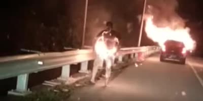 Man And His Car Both Up In Flames
