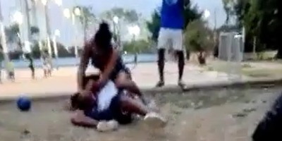 Female Wrestler Ragdolls Guy In A Fight