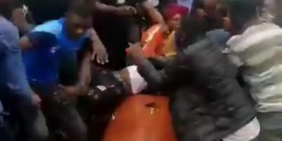 Large brawl at a funeral(R)