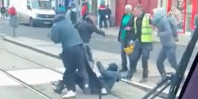 Irish Guys Fighting On Tram Tracks