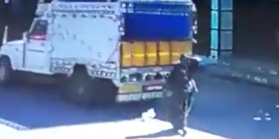 Woman Ran Over By Reversing Truck In India