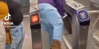 Obese Girl Refused To Pay For The Train Fair, Ends Up Getting Stuck Trying To Squeeze Her Big Ass Through.