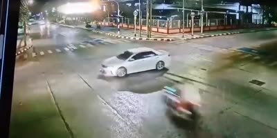 Thai Biker Sent Flying At Intersection