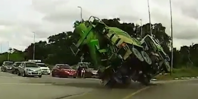 Cement Truck Overturns Nearly Killing Drivers In Malaysia
