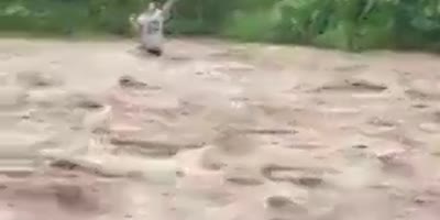 Man Carried Away By Stream In Colombia