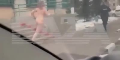 Crazy Naked Lady Assaults Moscow Cops