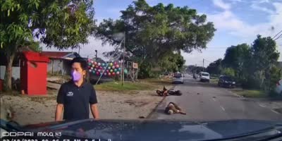 Motorcyclist Hit By Van In Indonesia
