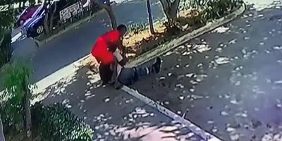 Dude In Red Robs Buddy Of The Cellphon At Knifepoint On Colombia