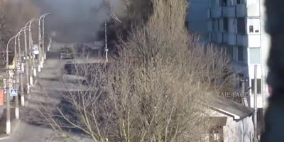 A Tank Fires In The Direction Of A Cameraman During Street Battles In Borodianka.