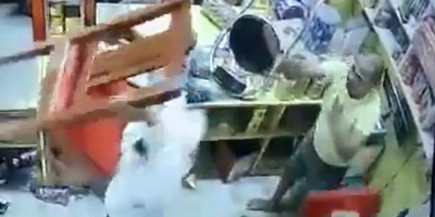 Brave Bald Store Owner Resists Gang Of Robbers In India