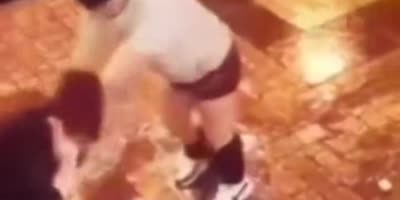Drunk man with his pants downs meets a pole.