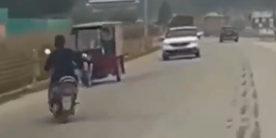 Biker VS Rickshaw In China