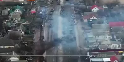 Drone View Of A Russian Convoy Of Tanks, APCs, And Support Vehicles Gets Ambushed.