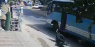 Woman Tumbles From Bus In India