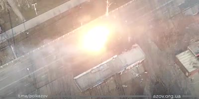 drone video of two Russian tanks being eliminated in Mariupol today