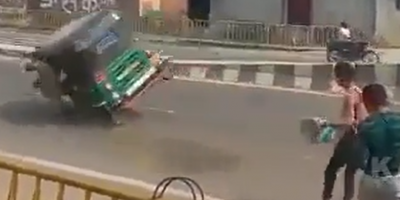 Protester Takes Out Rickshaw With A Rock In India