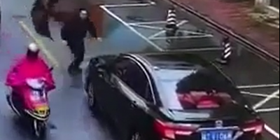 Brazen Insurance Scammer Caught On CCTV In China