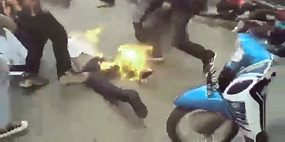 Protestor Blows it, Sets Himself on Fire