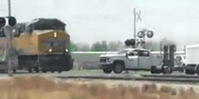 Texas: Stuck Truck Slammed by Passing Train