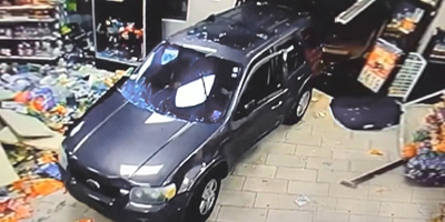 SUV Intentionally Runs People Over Inside A Gas Station.